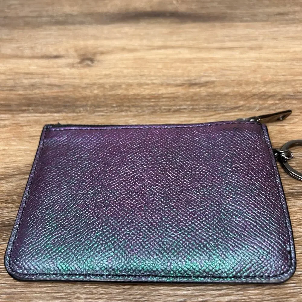 Coach purple hologram